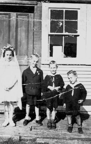 435: l-r Mary, Joe, Pat and Cam Dunphy, in front of McCarthy's shop. (1938) [courtesy of Mary (Dunphy)  Lamb]  - children of Thomas Dunphy &amp;amp; Anastasia Carroll